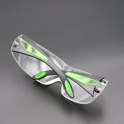 Universal anti-splash goggles by BACKUPMYFILESNOW.COM® with clear lenses, adjustable strap, and windproof dustproof eye protection.