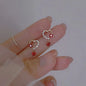 Silver color inlaid zircon clover tassel earrings for women, delicate chain pendant jewelry, perfect for parties and gifts.