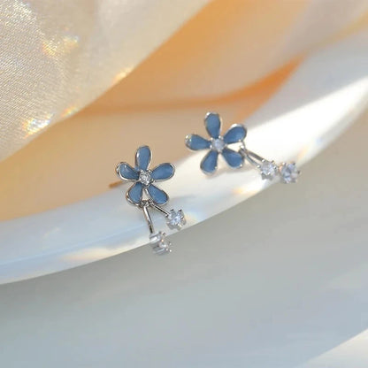 Silver inlaid zircon clover tassel earrings for women with delicate chain pendants, stylish party jewelry and accessories.