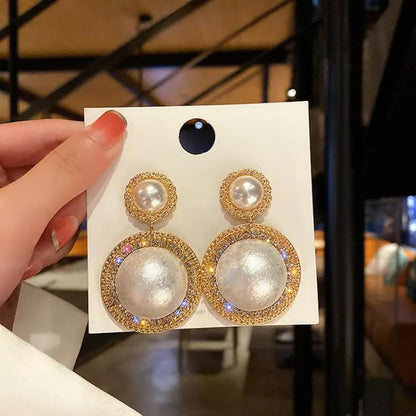 Large gold crystal pearl drop earrings for women, stylish Korean fashion jewelry suitable for parties and elegant occasions.