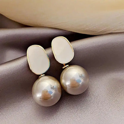 Gold large crystal pearl drop earrings for women, stylish Korean and European American fashion jewelry, perfect for parties.