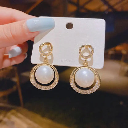 Large gold crystal pearl drop earrings for women, stylish Korean and European fashion jewelry, perfect for parties and special occasions.