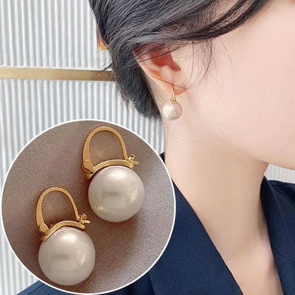 Gold crystal pearl drop earrings for women, large statement jewelry with Korean and European fashion style, perfect for parties.