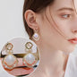 Gold large crystal pearl drop earrings for women, stylish Korean and European fashion jewelry, perfect for parties.