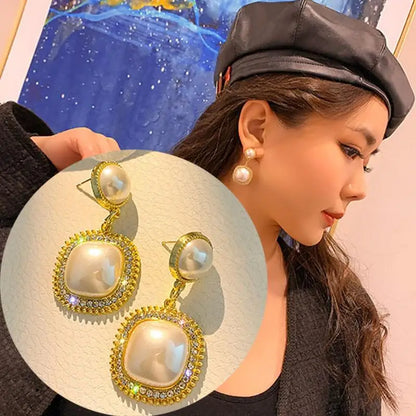 Gold large crystal pearl drop earrings for women, Korean fashion European American style, perfect for parties and elegant occasions.