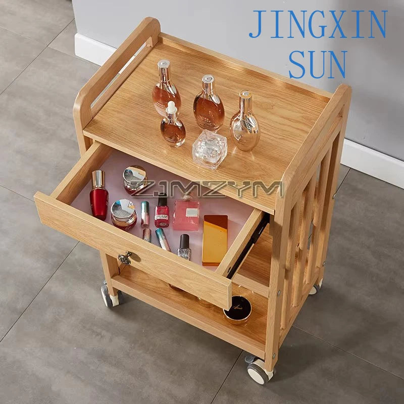 White modern beauty salon trolley with wheels, movable storage rack and drawers for salon tools and supplies.