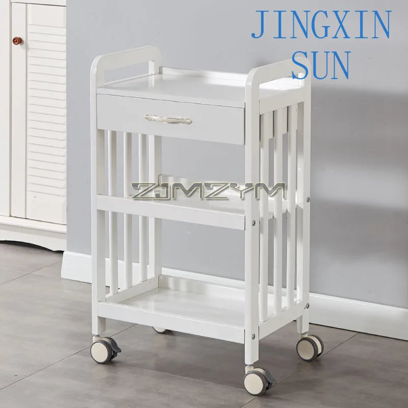 White modern beauty salon trolley cart with wheels, movable storage drawers, and a creative bar cart design for salon organization.