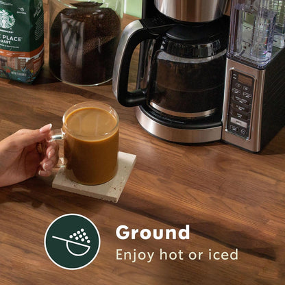Six 28 oz packs of Starbucks Dark Roast Ground Coffee, French Roast, suitable for hot or iced coffee brewing.