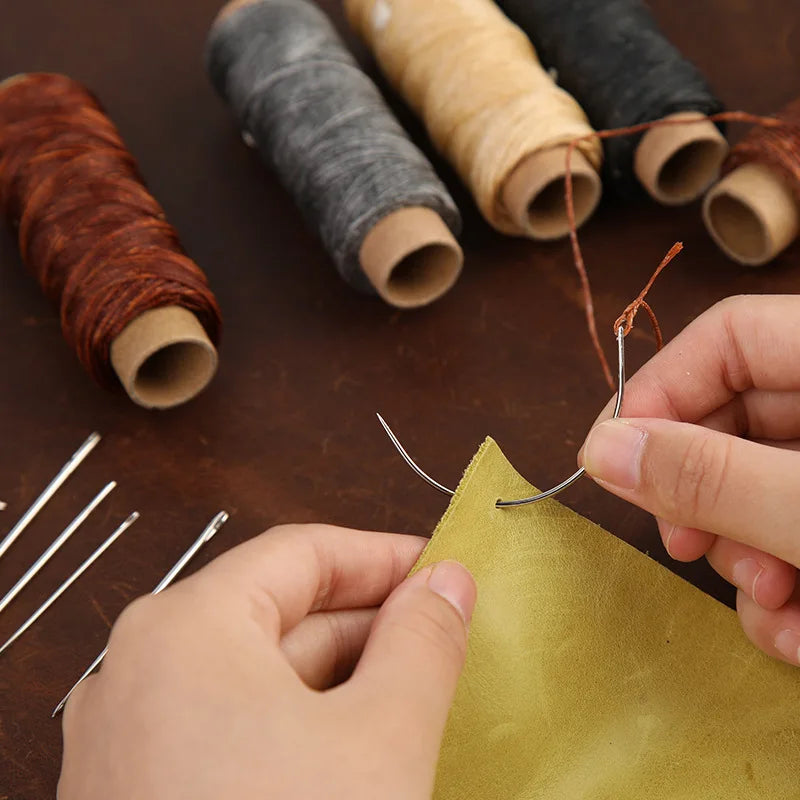Leather tools set for crafts including waxed thread, sewing awl, curved needles, and thimble for beginners and professionals.