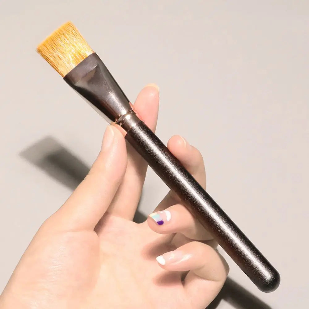 Large eyeshadow and contour makeup brush by BackupMyFilesNow.com, featuring soft bristles for foundation, concealer, and face blending.
