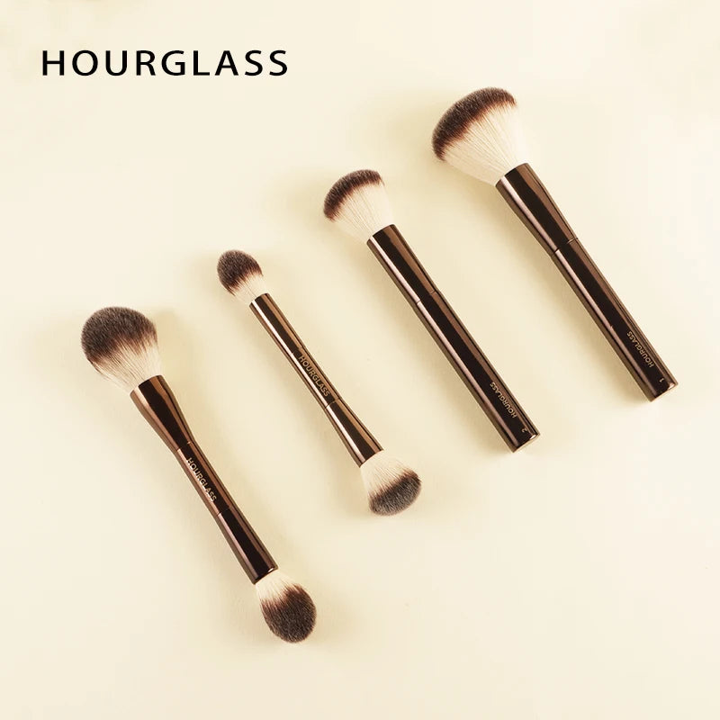 Hourglass makeup brush set with retractable professional brushes for eyeshadow, foundation, concealer, powder, bronzer, blusher, and eyeliner.