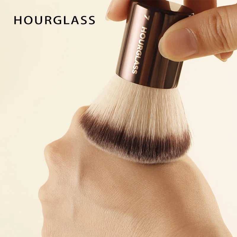 Hourglass makeup brush set by BackupMyFilesNow.com with retractable brushes for eyeshadow, foundation, concealer, powder, bronzer, and blush.