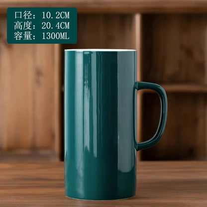 Yellow Creative Ceramic Mug with large handle, 1000ml capacity, perfect for coffee, tea, or water in a stylish, durable design.