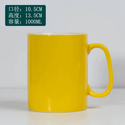 Yellow ceramic mug with large capacity, 1000ml or 1300ml, sturdy handle, ideal for coffee, milk, or water from BackupMyFilesNow.com