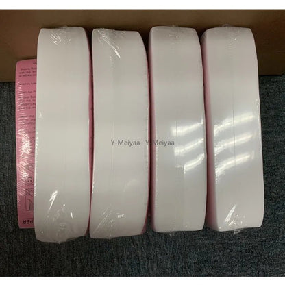 Assorted rolls of nonwoven body cloth hair removal wax strips in various quantities, high-quality epilator wax paper for hair removal.