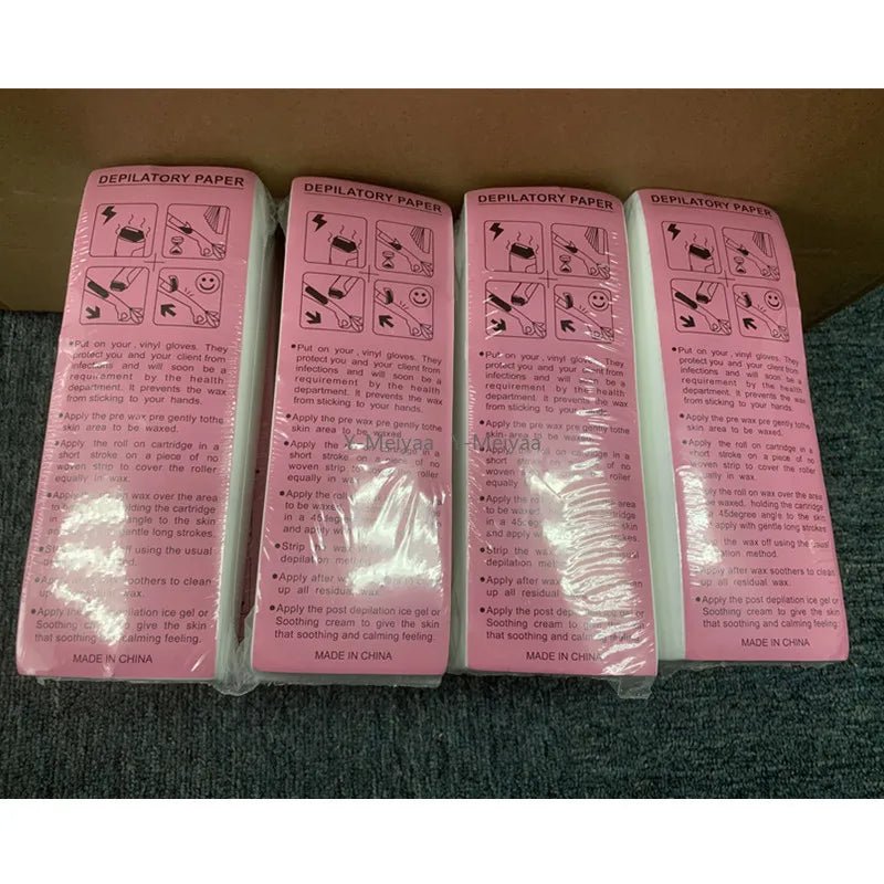 High-quality nonwoven body cloth wax strip rolls for hair removal, available in bulk packs of 100 to 1000 pieces.