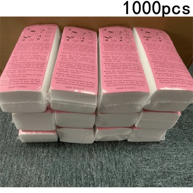 Assorted rolls of nonwoven body cloth hair removal wax paper strips in various sizes, high-quality wholesale epilator wax strip paper.