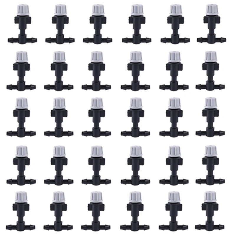 Set of 10 plastic garden watering irrigation misting sprinkler heads with T-joints for irrigation systems.