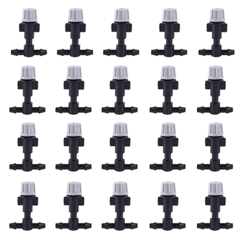 Set of 10 plastic garden misting sprinkler heads with tee joints for irrigation and watering systems.