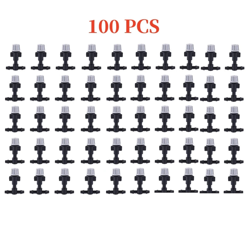 Set of 10 plastic garden irrigation misting sprinkler heads with T-joint nozzles for watering systems.