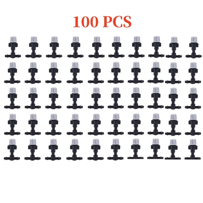 Set of 10 plastic garden irrigation misting sprinkler heads with T-joint nozzles for watering systems.