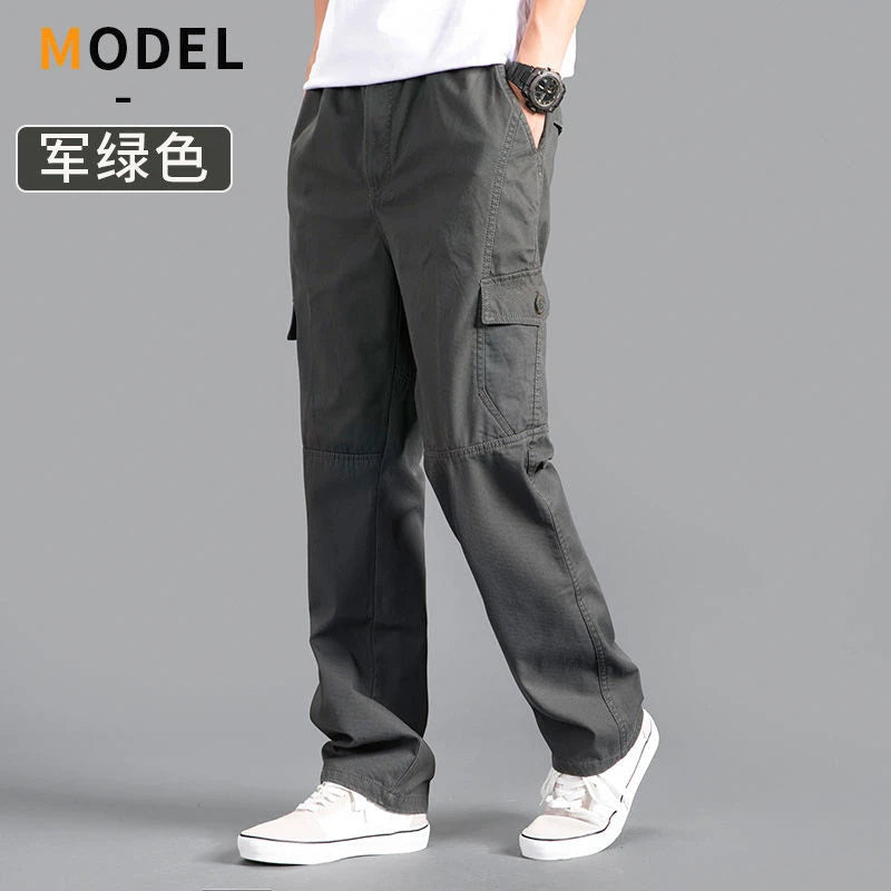 Men's black cotton cargo work pants featuring a casual fit, multiple pockets, and tapered jogger style for spring and fall wear.