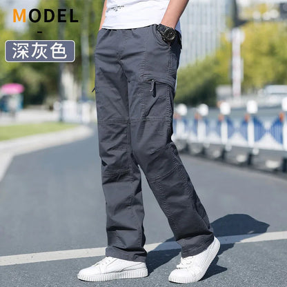 Men's black cotton cargo pants with multiple pockets, casual and climbing joggers, suitable for work, sports, and outdoor activities.