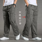 Men's black cotton cargo pants by BACKUPMYFILESNOW.COM®, casual work and climbing joggers with a relaxed fit for spring and summer.