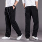 Black cotton men's cargo pants with multiple pockets, casual work and climbing joggers, suitable for summer, spring, and autumn.