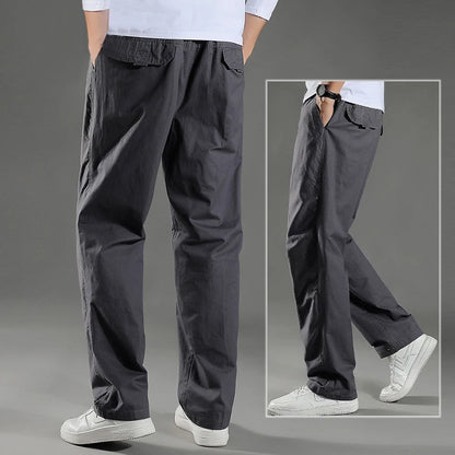 Men's black cotton cargo pants from BACKUPMYFILESNOW.COM®, casual work and climbing joggers with a relaxed fit for spring and summer.