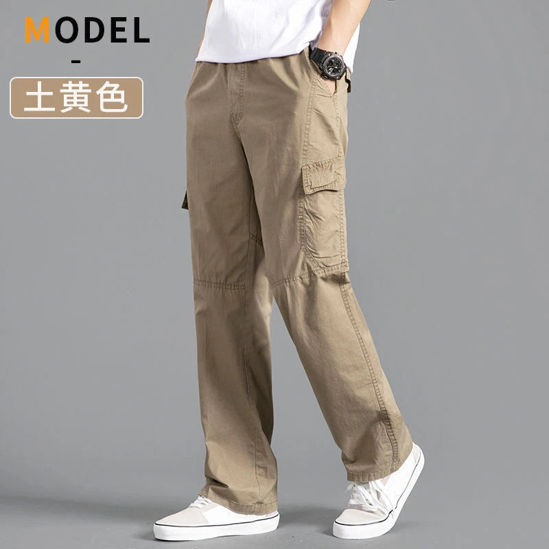 Men's black cotton cargo pants with casual fit, featuring multiple pockets, suitable for work, climbing, and sports in spring and autumn.