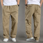 Men's black cotton cargo pants with multiple pockets, casual work and climbing joggers, suitable for spring and autumn.