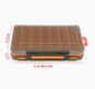 Blue durable dual-sided fishing tackle box with 14 compartments, ideal for organizing fishing gear.
