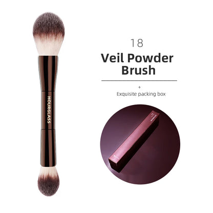 Hourglass makeup brushes set with various tools for powder, foundation, concealer, blush, bronzer, eye shadow, eyebrows, and eyeliner application.