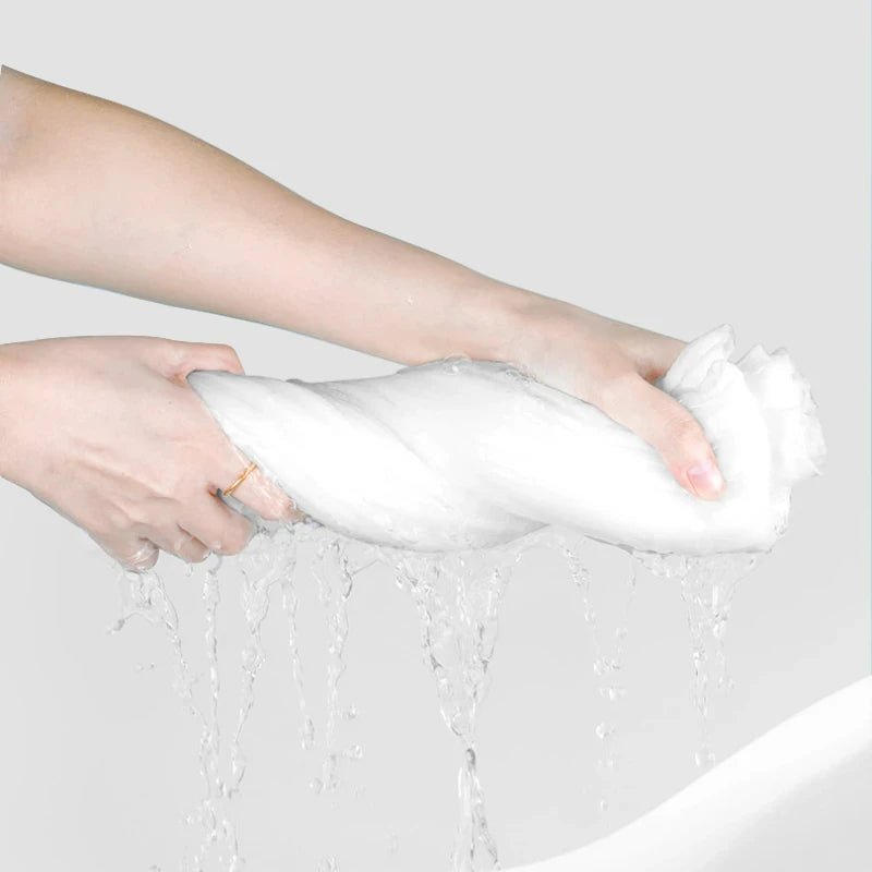 14-pack disposable washcloths by BACKUPMYFILESNOW.COM®, portable travel towels, thickened compressed face cleansing squares.