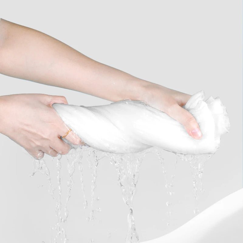 14-pack disposable washable face towels by BACKUPMYFILESNOW.COM®, compact thickened travel cloths for cleansing and skincare.