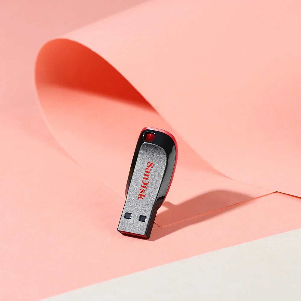 SanDisk SDCZ50 USB flash drive with 128GB capacity, compact mini pen drive, black plastic body, for PC data storage.
