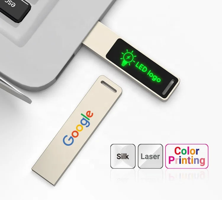 Silver USB flash drive with glowing logo, 16GB capacity, designed for photo storage and external data backup by BackupMyFilesNow.