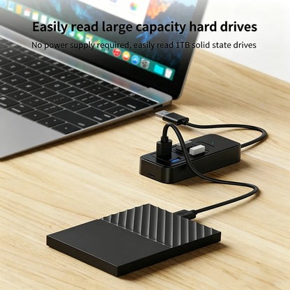 USB-C to 4-port USB 3.0 hub with power supply, high-speed data transfer, plug-and-play design for laptops.