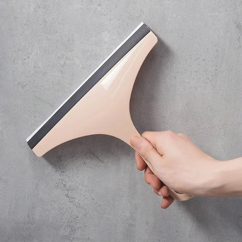 Green silicone water wiper plate for glass cleaning, car windshield, window, bathroom, and kitchen surfaces.