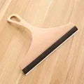 Green silicone water wiper plate cleaner and scraper for car windshield, window, bathroom, and kitchen surfaces.
