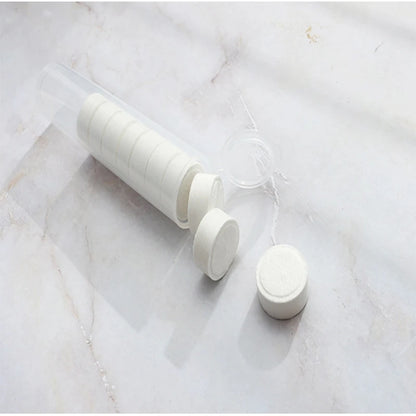 Portable compressed non-woven towels for travel, camping, and hiking, moisture-wrapped disposable face towels in a compact pack.