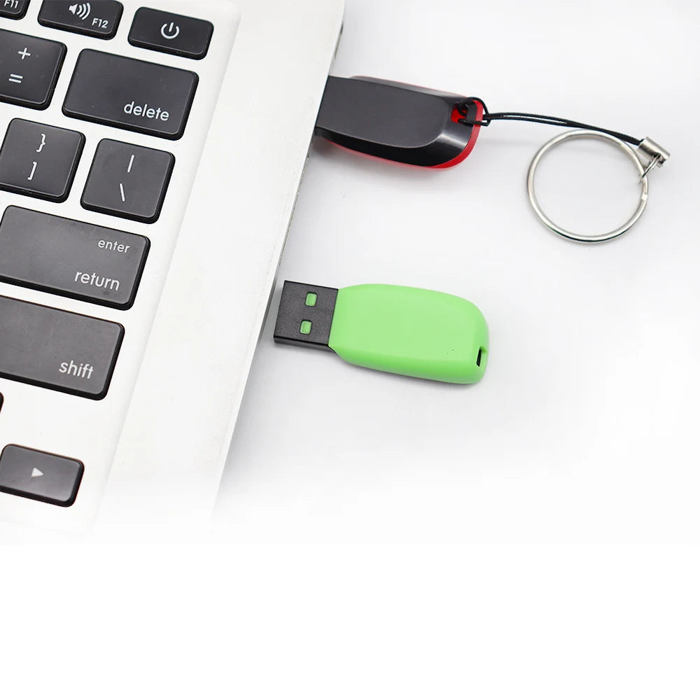 Red USB flash drive with custom logo, available in 1GB to 64GB, plastic body, BackupMyFilesNow.com brand, compact and portable.