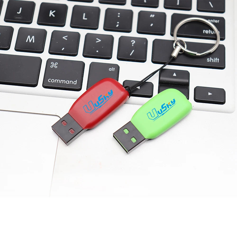 Red USB flash drive from BackupMyFilesNow.com, available in 1GB to 64GB, with custom logo and plastic mini design.