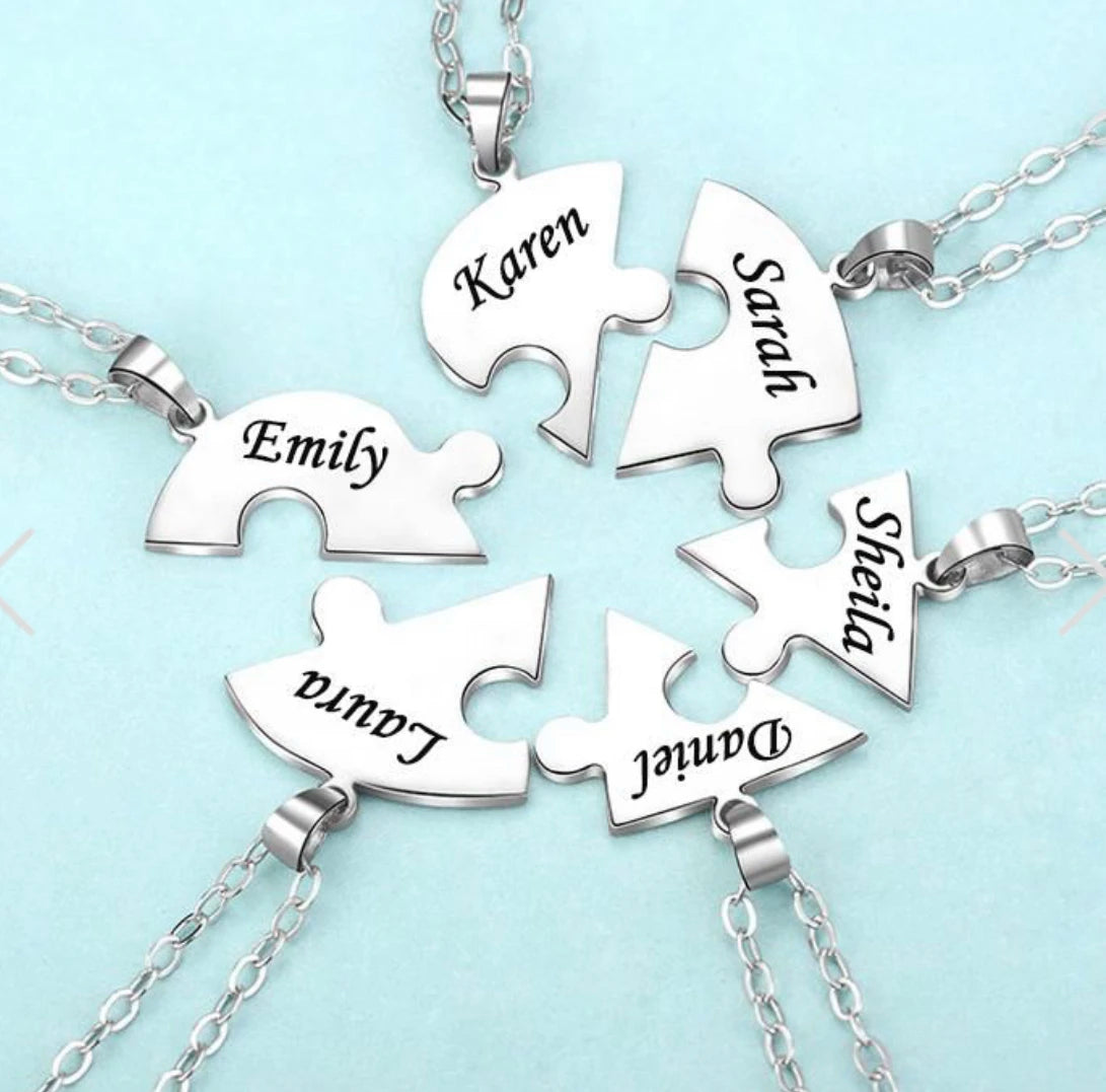 Steel heart pendant necklace with engraved custom names from MaiLun, featuring puzzled heart design on a 50cm chain.