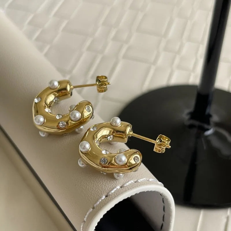 Colorful zircon C-shape stud earrings for women with gold-tone stainless steel and crystal accents, stylish dangle jewelry.