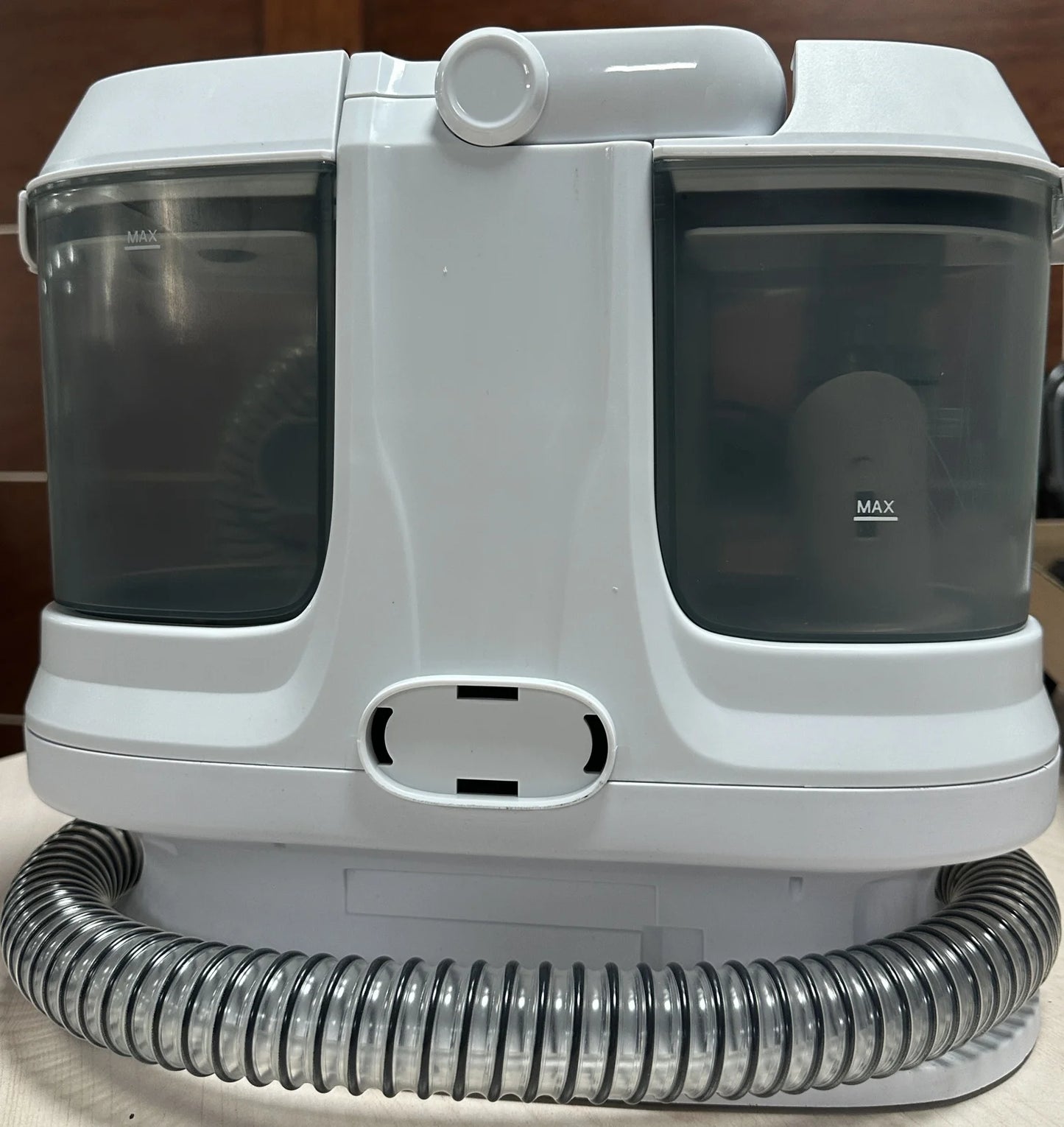Electric wet and dry household carpet cleaner by BACKUPMYFILESNOW.COM® with removable water tank, suitable for hotels, cars, and RVs.