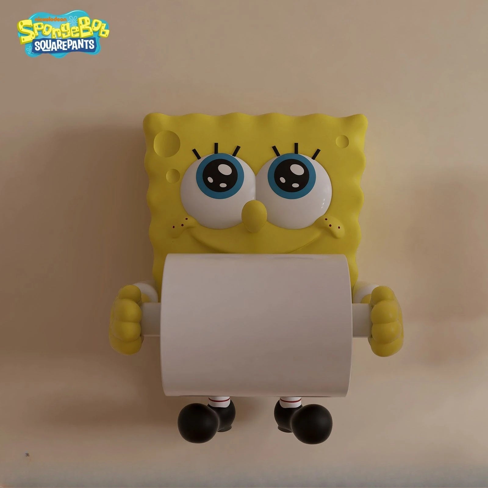 Colorful cartoon sponge-shaped toilet paper roll holder and paper towel dispenser for bathroom or kitchen decor.