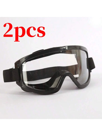 Pair of white safety goggles with clear lenses, anti-splash dust-proof eye protection for industrial lab work by BACKUPMYFILESNOW.COM®.