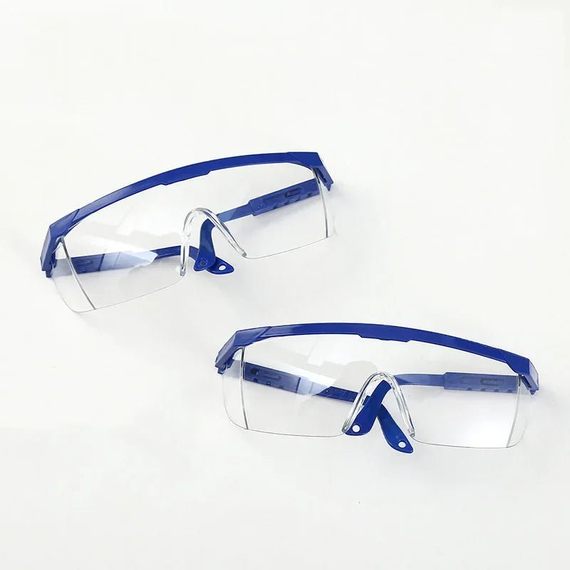 Pair of chemical goggles from BACKUPMYFILESNOW.COM® with dustproof, windproof, and splash-proof safety protection for laboratory work.